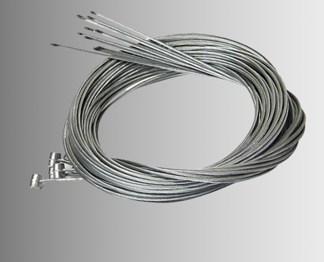 Stainless steel brake inner wire with polymer-lined housing and alloy ferrules for smooth mechanical braking