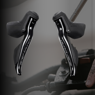Shimano STI hydraulic brake lever with adjustable reach and integrated hood for drop-bar road bikes