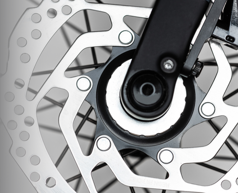 160mm centerlock road rotor with cooling fins and asymmetric drill holes for aerodynamic braking