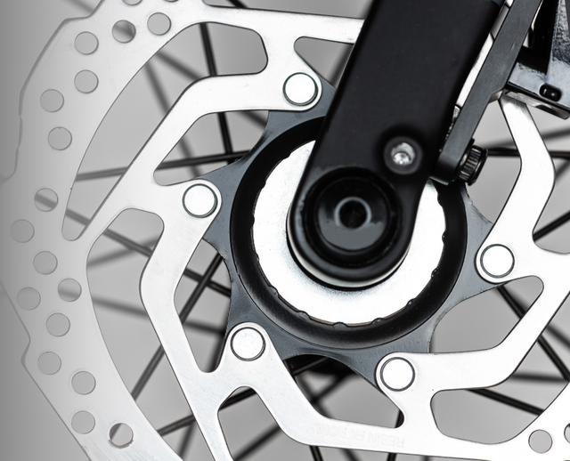 160mm centerlock road rotor with cooling fins and asymmetric drill holes for aerodynamic braking