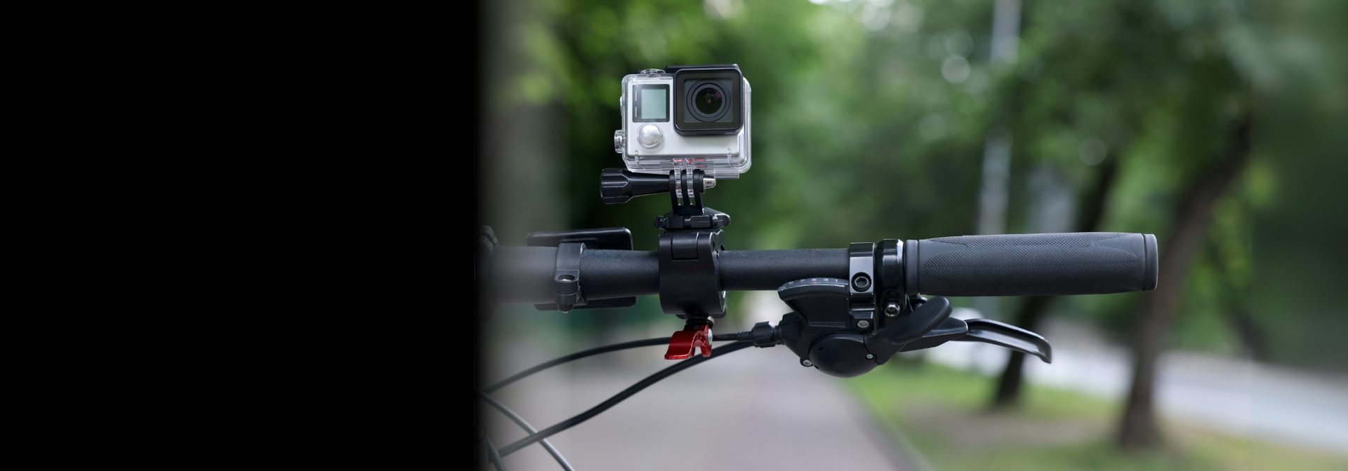 Cycling camera with rotating handlebar mount capturing 170° wide-angle commuter rides in day/night mode