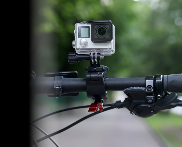 Cycling camera with rotating handlebar mount capturing 170° wide-angle commuter rides in day/night mode