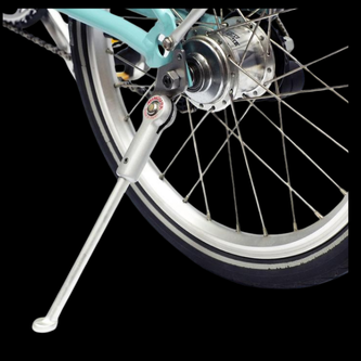 Bolt-on kickstand mount at chainstay dropout with tension spring mechanism for automatic retraction