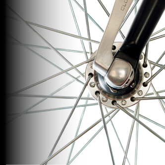 3mm square nipple driver tool adjusting tension on a carbon road wheel during truing