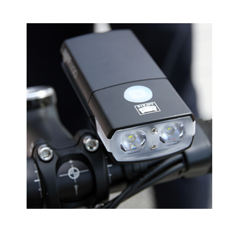 Cateye AMPP1100 bike front light with dual LEDs, delivering 1100 lumens for enhanced visibility during night rides.