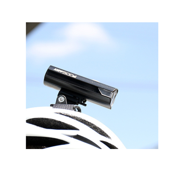 The AMPP500s bike light securely mounted on the handlebar, providing bright and reliable illumination for cyclists in low-light conditions.