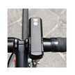The AMPP800 bike light securely mounted on the handlebar, offering a bright, focused light for safer night cycling.
