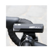AMPP800 front bike light mounted on a bicycle, providing focused illumination for enhanced road safety during evening cycling adventures.