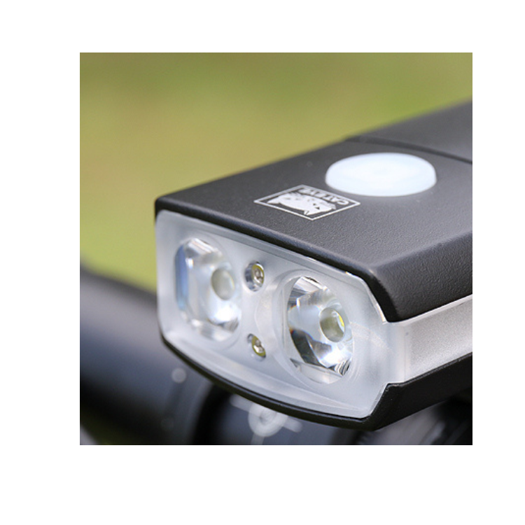 Close-up of the Cateye AMPP1100 bike light, featuring bright LED lights for superior outdoor cycling experiences.