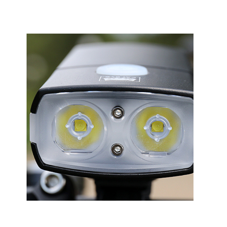 Cateye AMPP1100 close-up, showcasing dual LED lights for maximum brightness and clarity during cycling.