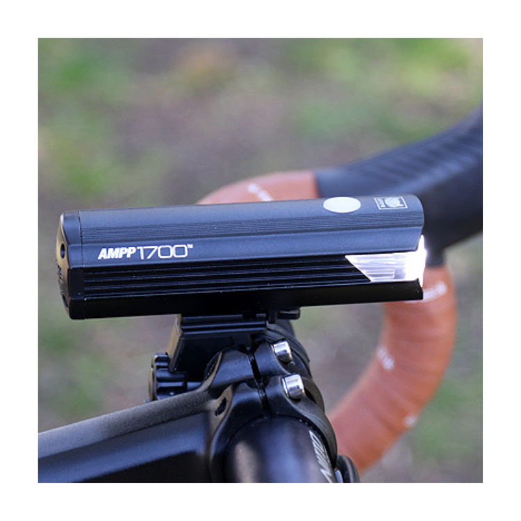Cateye AMPP 2200 bike light with USB charging port in hand