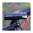 Cateye AMPP 2200 bike light with USB charging port in hand