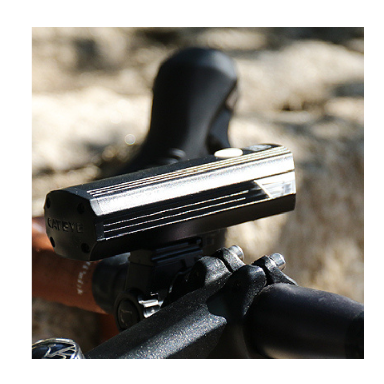 Cateye AMPP 2200 front bike light mounted on a bicycle handlebar