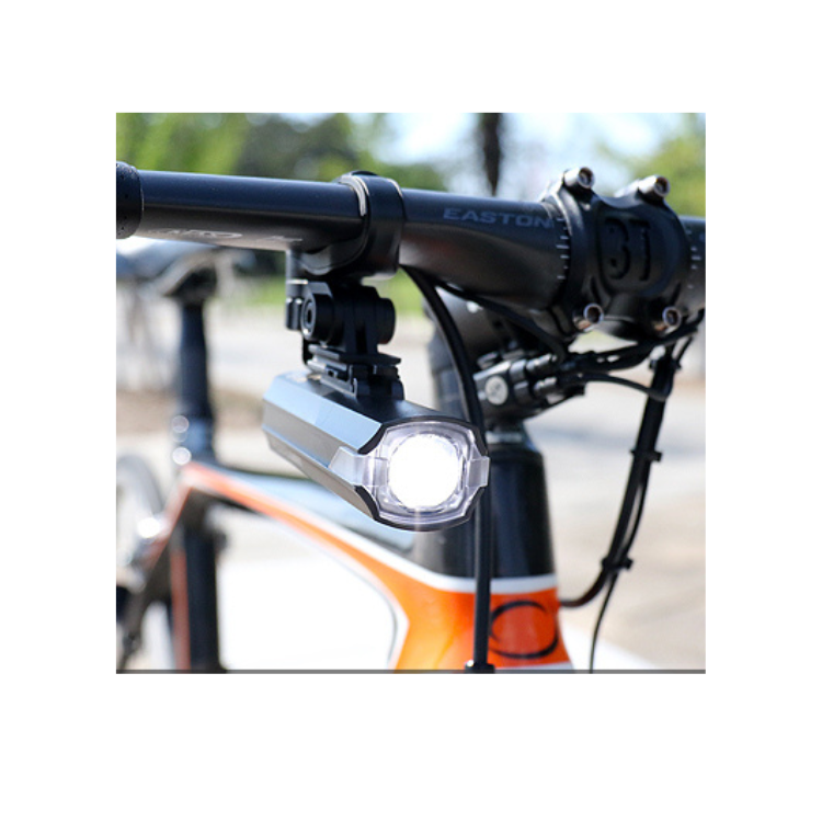 Cateye AMPP 400s front bike light mounted on handlebars, offering bright and reliable lighting for cycling.