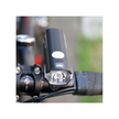 Close-up view of the Cateye AMPP 500S front light, highlighting its advanced design and bright beam for enhanced cycling safety.