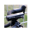 Cateye AMPP 500S front light mounted on bike handlebars, offering powerful illumination for safer cycling in low-light conditions.
