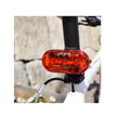 Cateye rear LED light attached to the bike frame, ensuring maximum visibility with bright red LED lighting for cyclists.
