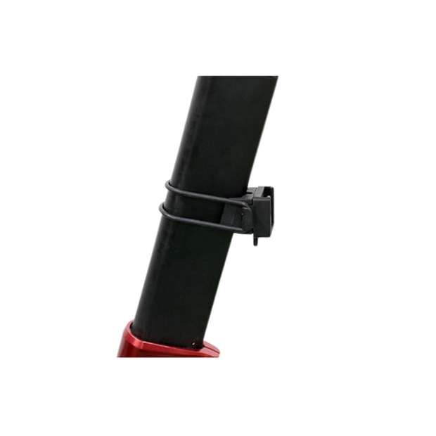 Cateye rear light clamp mount attached to a bike frame, providing secure positioning for the light for improved visibility while cycling.