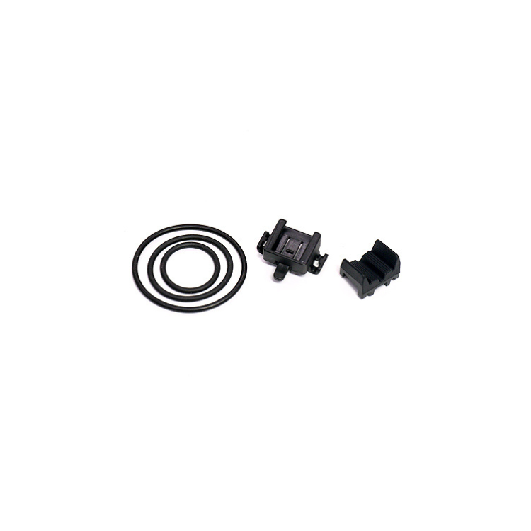Cateye rear light mounting kit including mounting base, two adjustable O-rings, and attachment bracket for easy installation on various bike frame sizes.