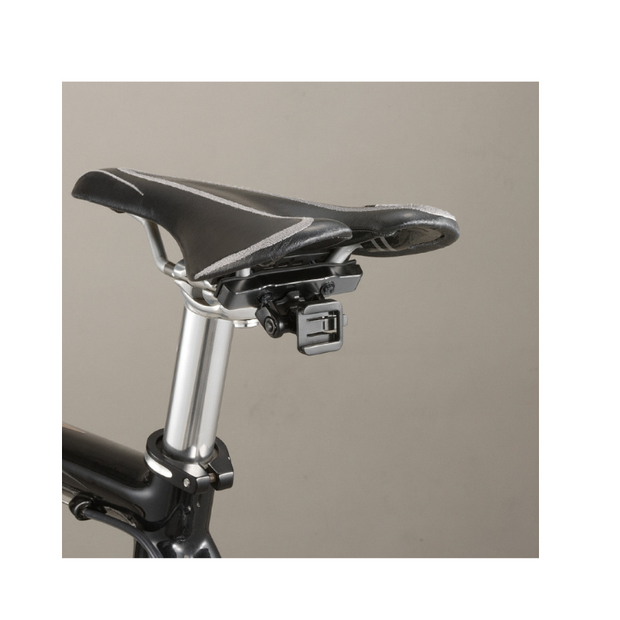 Cateye saddle mount for bike light, providing a secure and stable attachment to the seat post for increased visibility and safety during cycling.