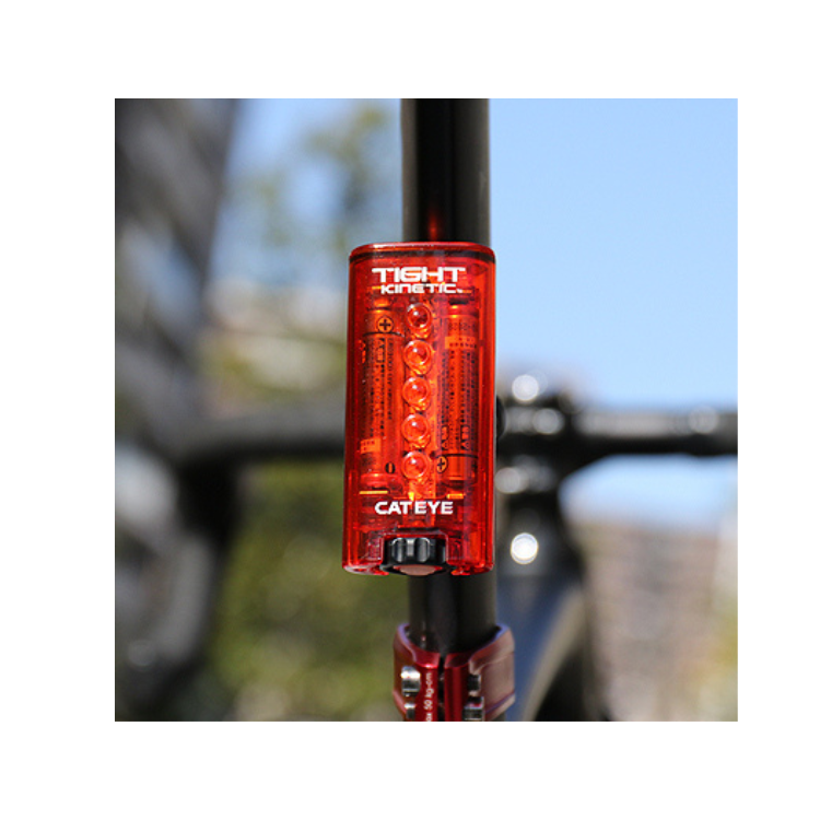 Cateye Tight Kinetic rear light mounted on a bicycle, showcasing its bright LEDs for enhanced road safety and visibility.