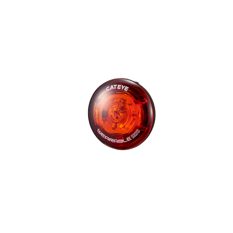 Cateye wearable mini LED light in a compact round design, offering bright red illumination for visibility during outdoor activities.