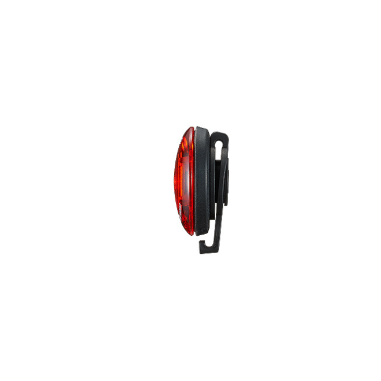 Cateye wearable mini LED light shown from the side, emphasizing its slim design and bright red visibility for safety during nighttime activities.