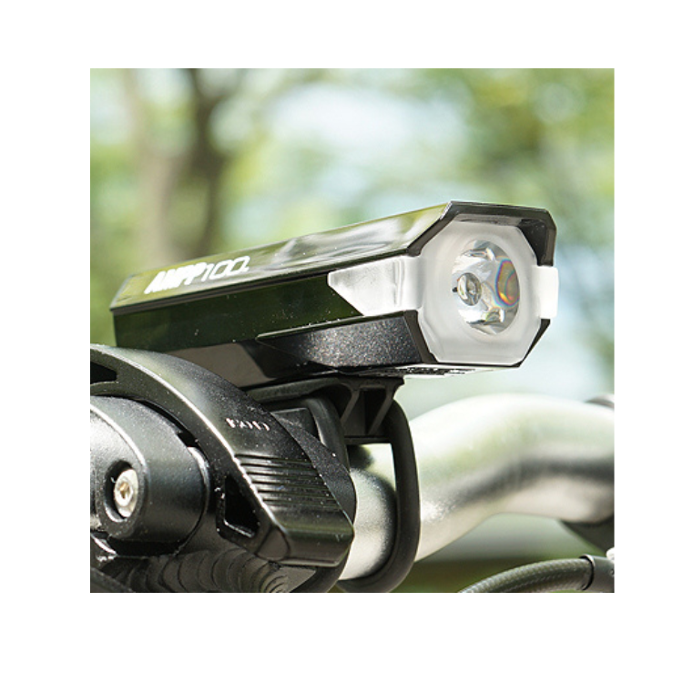 Cateye AMPP 100 front bike light mounted securely on handlebars for optimal road visibility.