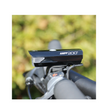 Cateye AMPP 200 front bike light securely mounted on a bike handlebar, designed for maximum brightness.