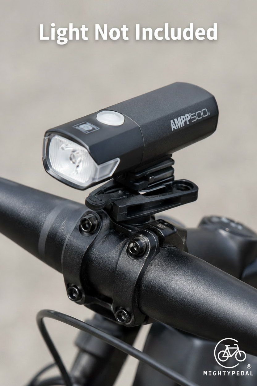 Bicycle headlight attached to handlebars with 'AMPP500' branding.