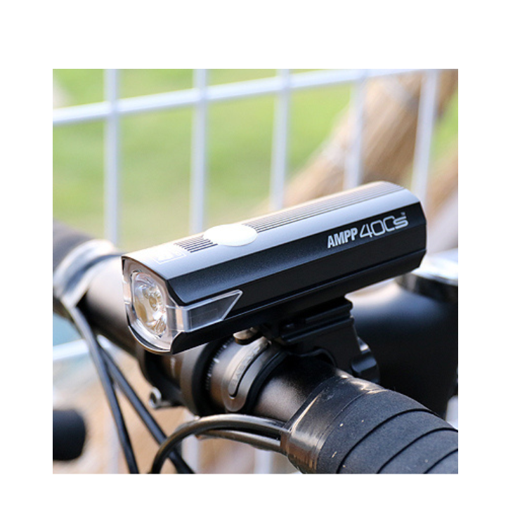 Cateye AMPP 400s front bike light mounted on handlebars, providing optimal brightness and visibility during cycling.
