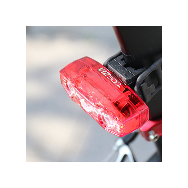 Cateye VIZ300 rear bike light attached with a secure mounting strap to the bike seat post.