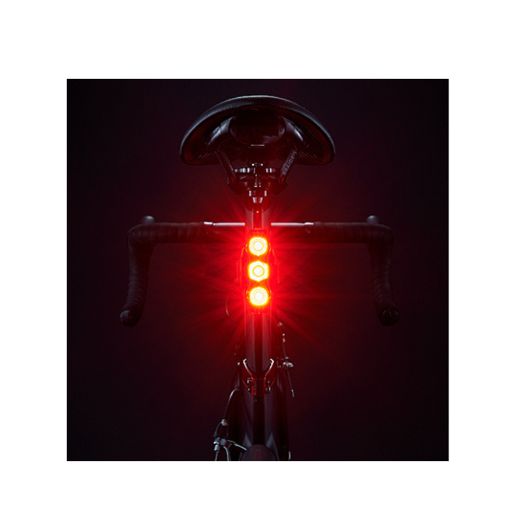Close-up of Cateye VIZ300 rear light showing the USB-C charging port for easy recharging.