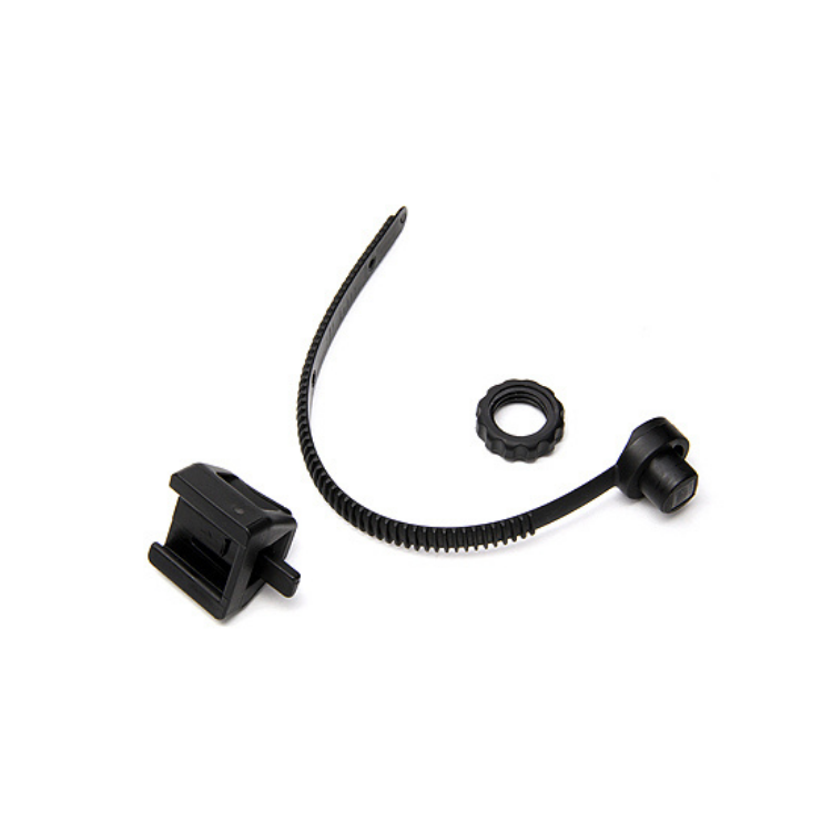 Separated components of a black bike light mount including strap, lock ring, and base.