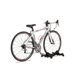 Eddy Merckx road bike featuring a red Minoura AB100-4.5 bottle cage and dual-wheel stand.