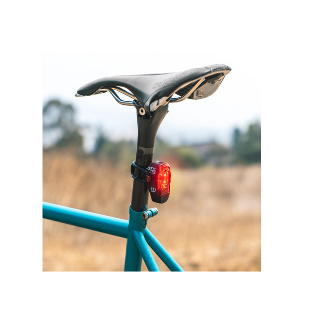 Lezyne KTV Pro Drive rear bike light mounted on the saddle, red LED light, perfect for increased visibility.