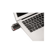 Lezyne LED front bike light attached to a laptop for easy USB charging, demonstrating its versatile design and compact form for cyclists.