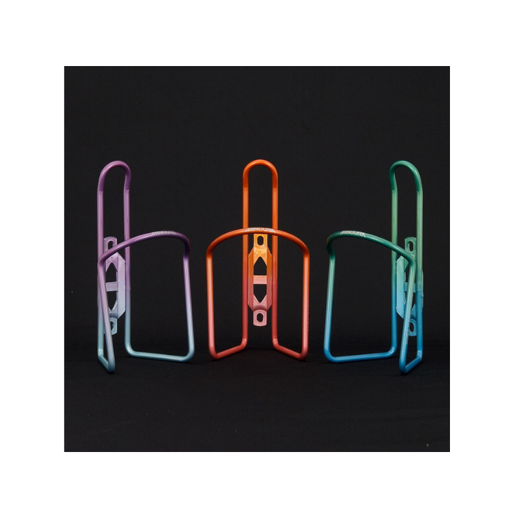 Trio of Lezyne CNC bottle cages in purple-blue, orange, and green-blue gradient.