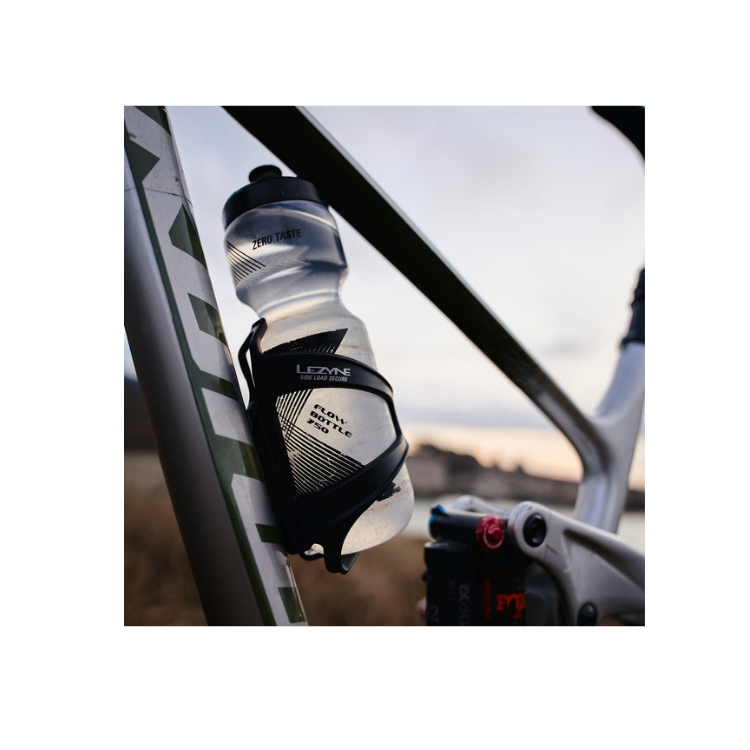 Lezyne Flow bottle cage with water bottle securely mounted on bicycle frame.