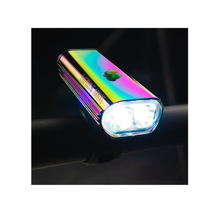 Lezyne Lite Drive 1000XL in rainbow finish, showcasing its bright dual LEDs mounted on a bike for optimal visibility.