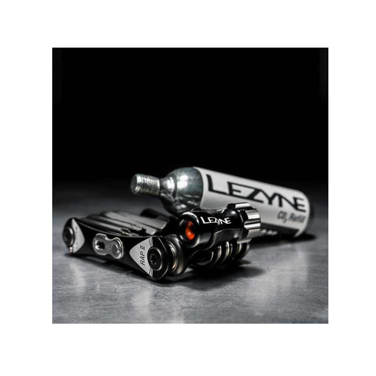 Lezyne RAP II Multi Tool alongside a CO2 canister for quick tire inflation and versatile bike repairs.
