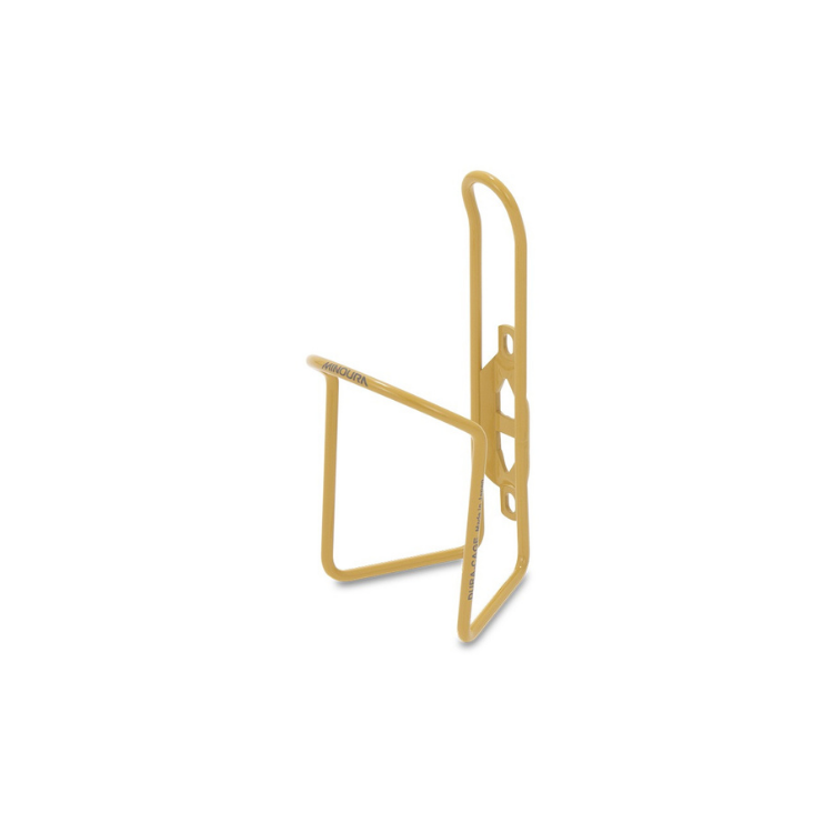 Sleek Minoura bottle cage in metallic gold for secure bottle holding on rides.