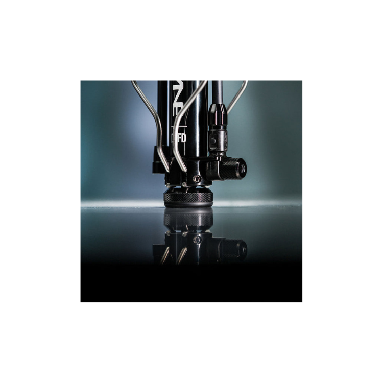 Macro view of the reinforced pump base with sturdy metal legs for long-lasting stability.