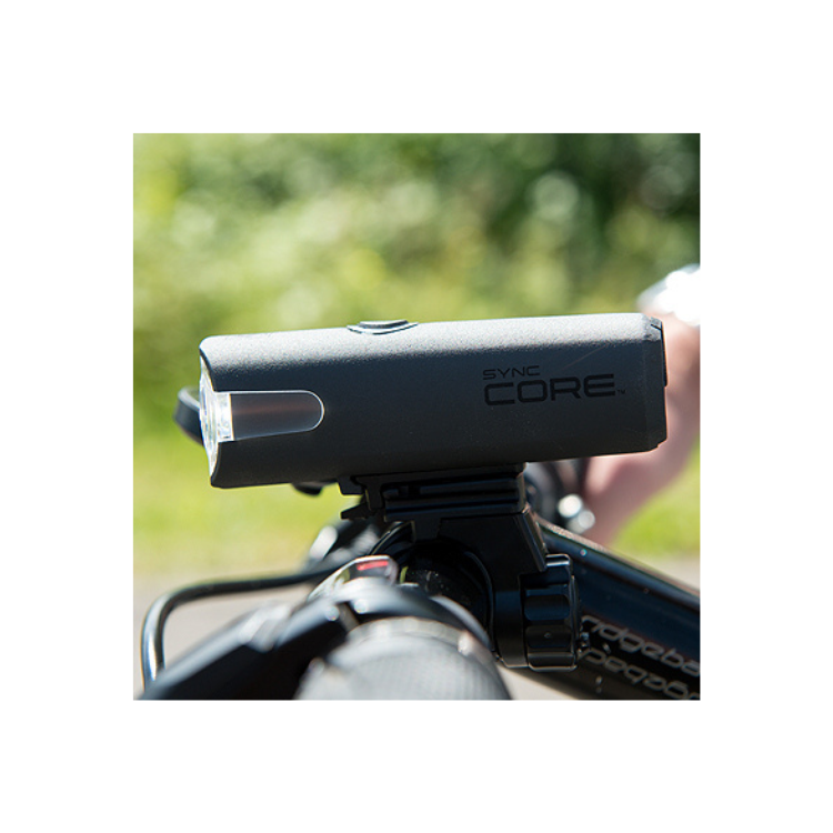 Sync Core Bicycle Front Light Mounted - Sync Core bike light mounted on handlebars, providing clear illumination for cycling in low-light conditions.